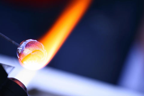 Flame applied to glass exhibiting characteristic yellow sodium flare