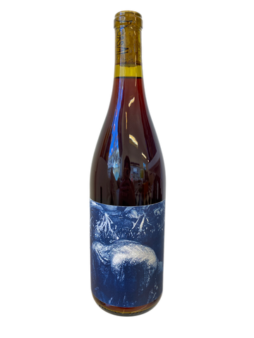 BOTTLE OF RED WINE WITH BLUE ABSTRACT LABEL