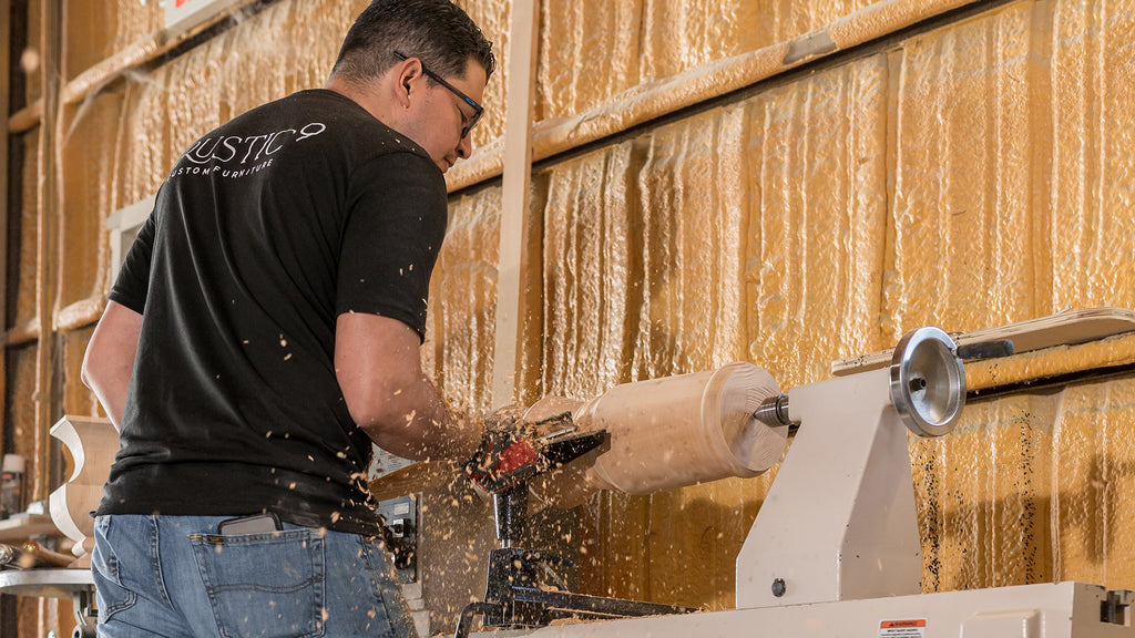 Man shaping wood with machine