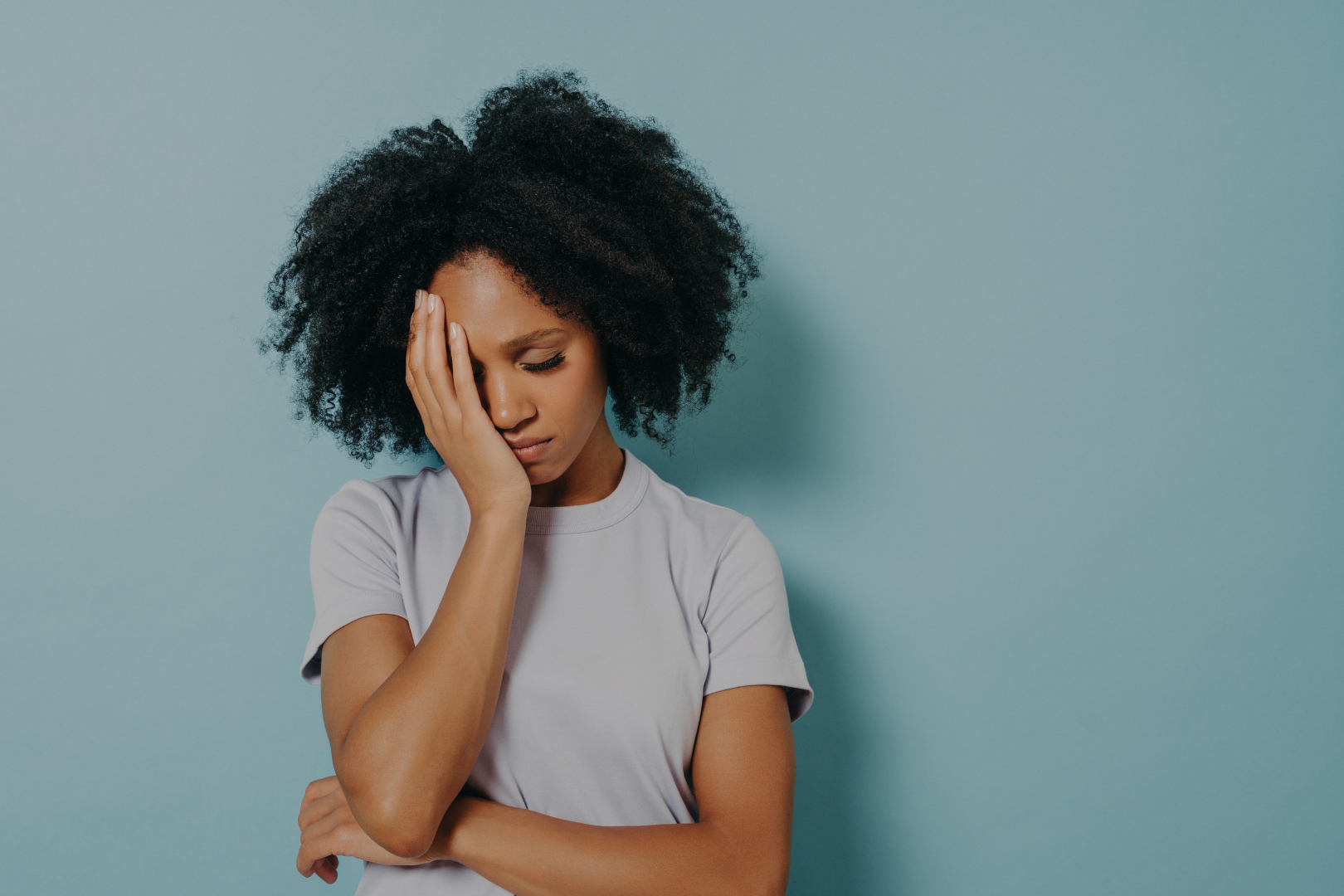 A woman who appears to be stressed