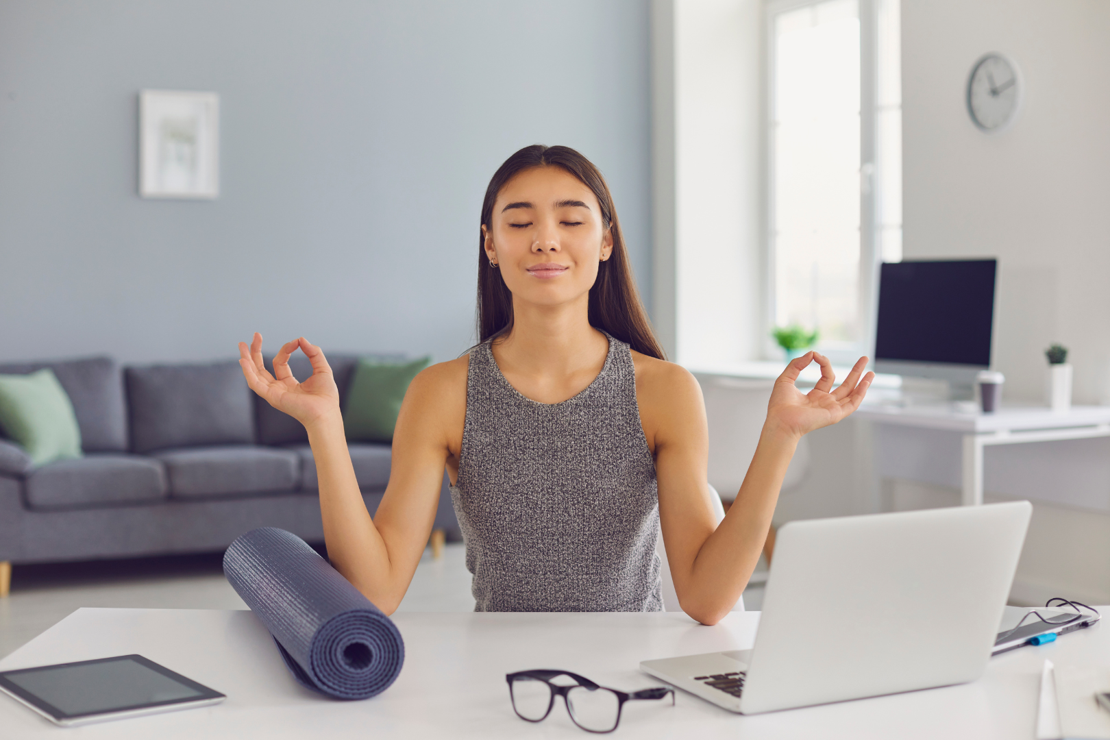 A person sitting with proper posture.