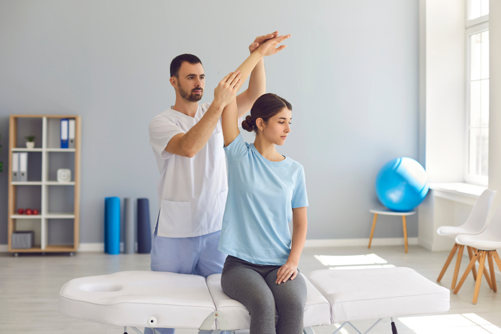 Chiropractor adjusting a patient