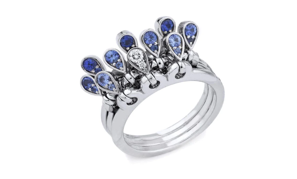 A diamond and sapphire drop ring