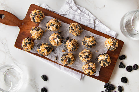 Mini Goat Cheese Balls With Sunrise Fresh Dried Cherries And Walnuts On Serving Board