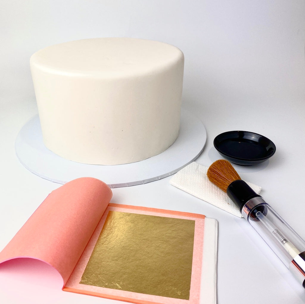 tutorial cake covered with edible gold leaf