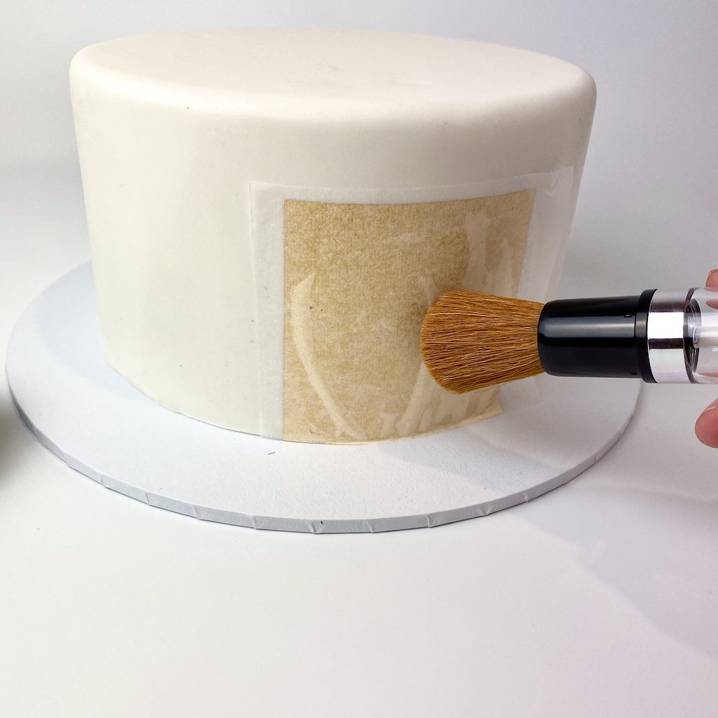 tutorial cake covered with edible gold leaf