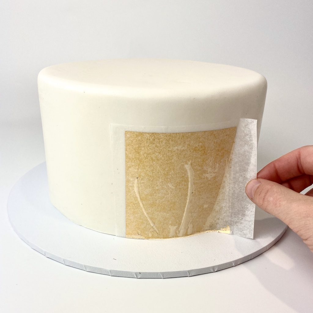 tutorial cake covered with edible gold leaf