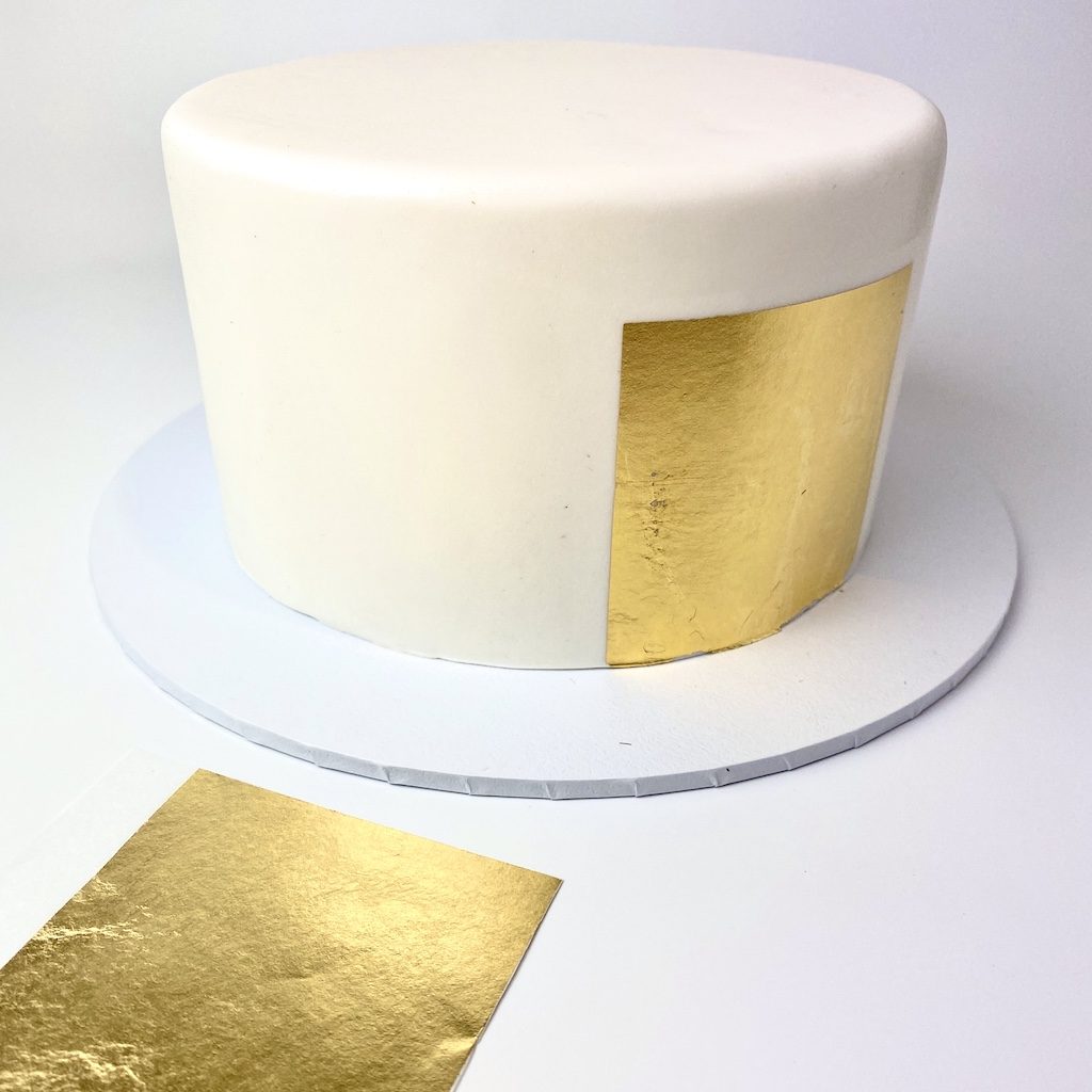 tutorial cake covered with edible gold leaf