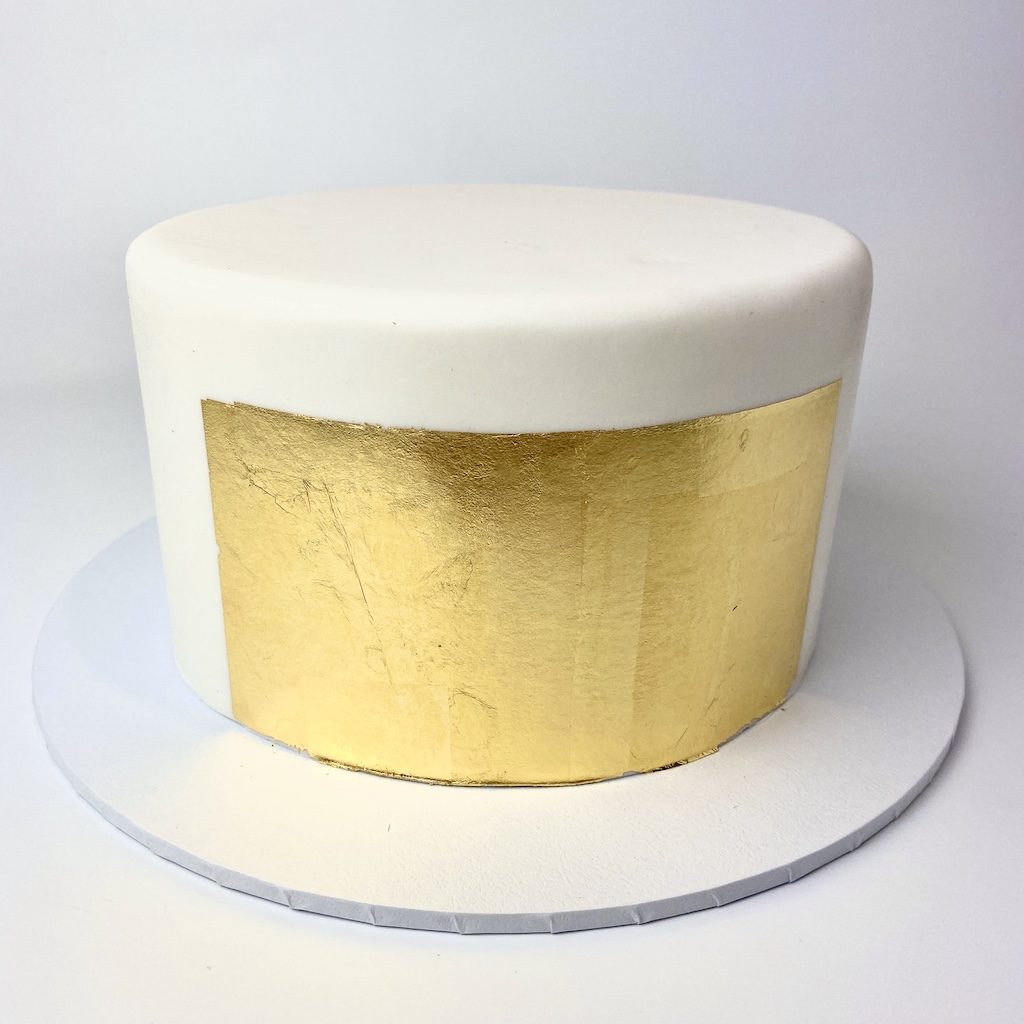 tutorial cake covered with edible gold leaf