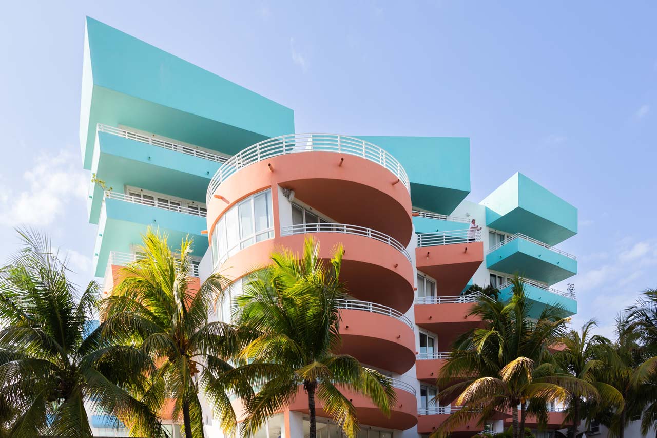 Impressive art deco building in pastel blue and pink papaya in Miami Beach