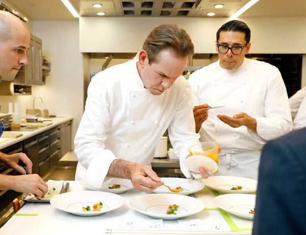 Thomas Keller with his staff