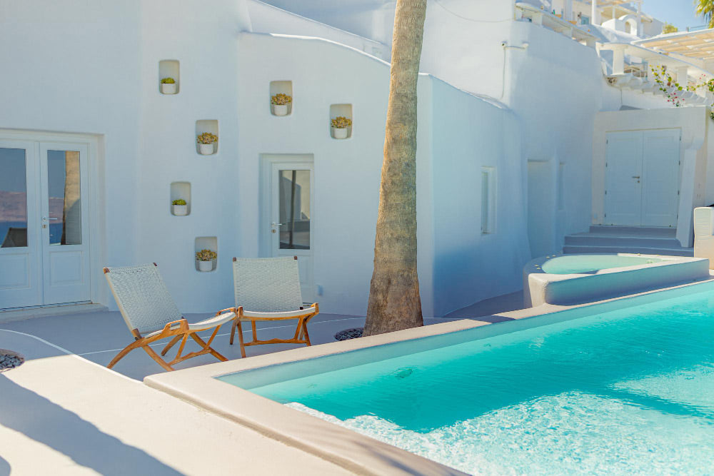 Beautiful swimming pool in luxury house in Santorini, Greece