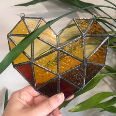 stained glass geometric heart in yellows and browns