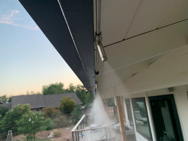 Backyard Misting Systems: Nozzle Spraying Water in the Backyard