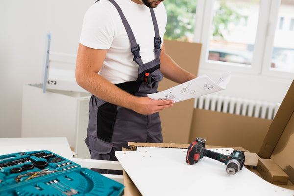 Man reading an installation manual