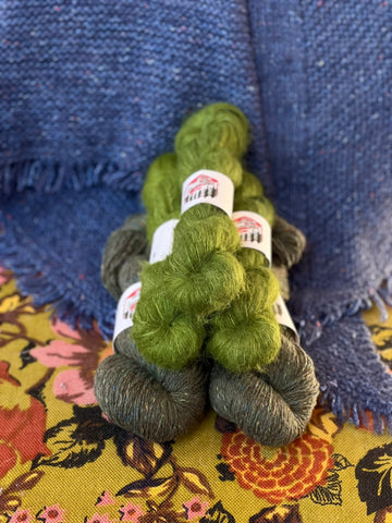 A pyramid of green yarn.