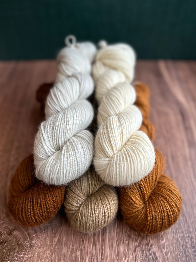 A pile of Dimond Laine Percy in creams and browns.