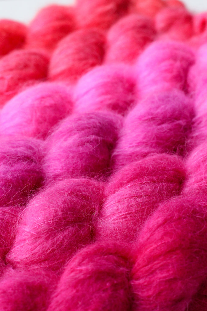 A pile of bright pink yarn.