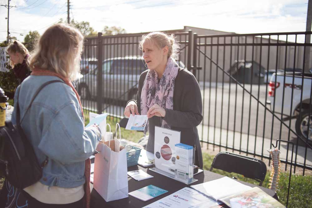 Achieve Balance Chiropractic booth at Hempsley event in Columbia, Missouri