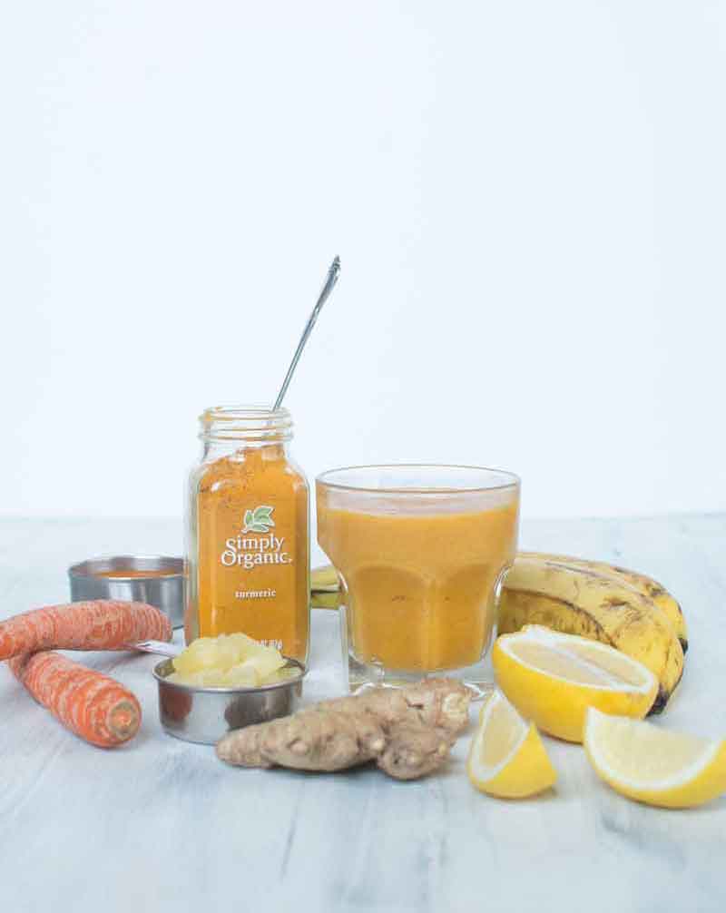 Flu fighter smoothie recipe with lemon, carrot, turmeric, ginger, pineapple, banana