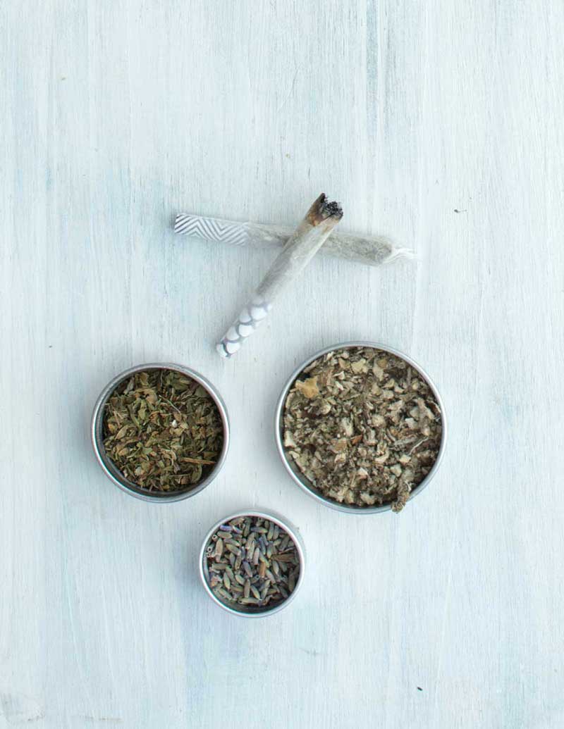 Lavender, peppermint, mullein next to herbal blend joint cones