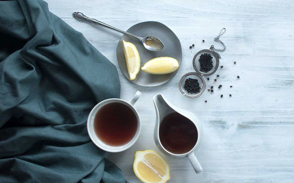 Elderberry and lemon tea styled with cloth