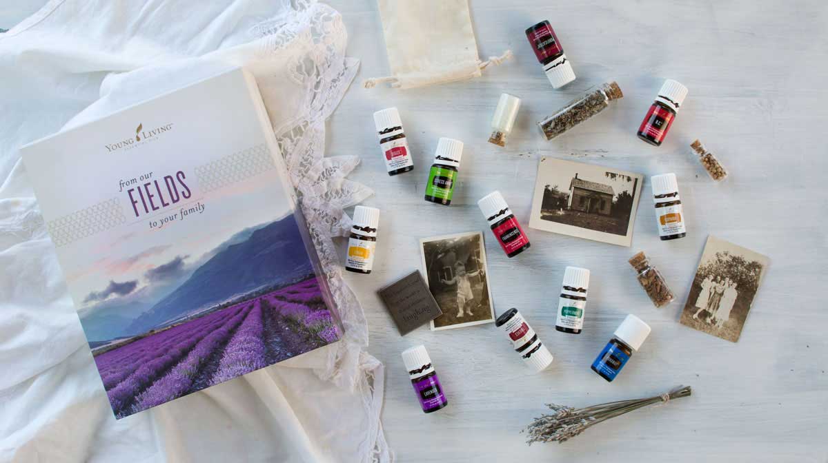 Young Living essential oil starter kit styled with vintage photos and herbs