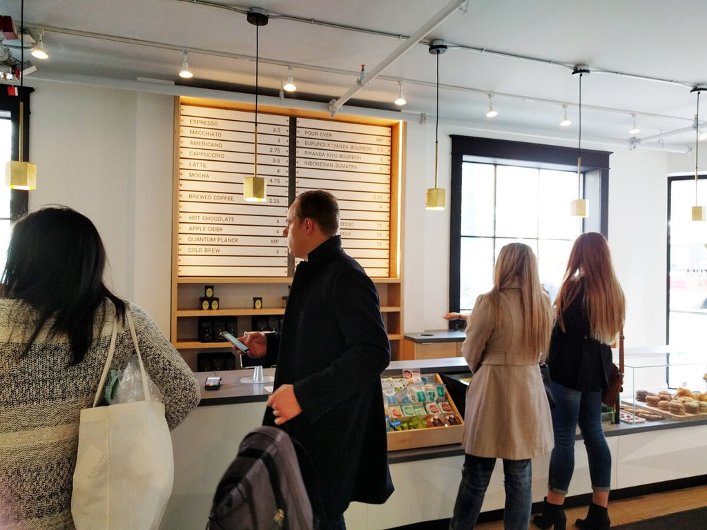Customers ordering at Quantum Coffee