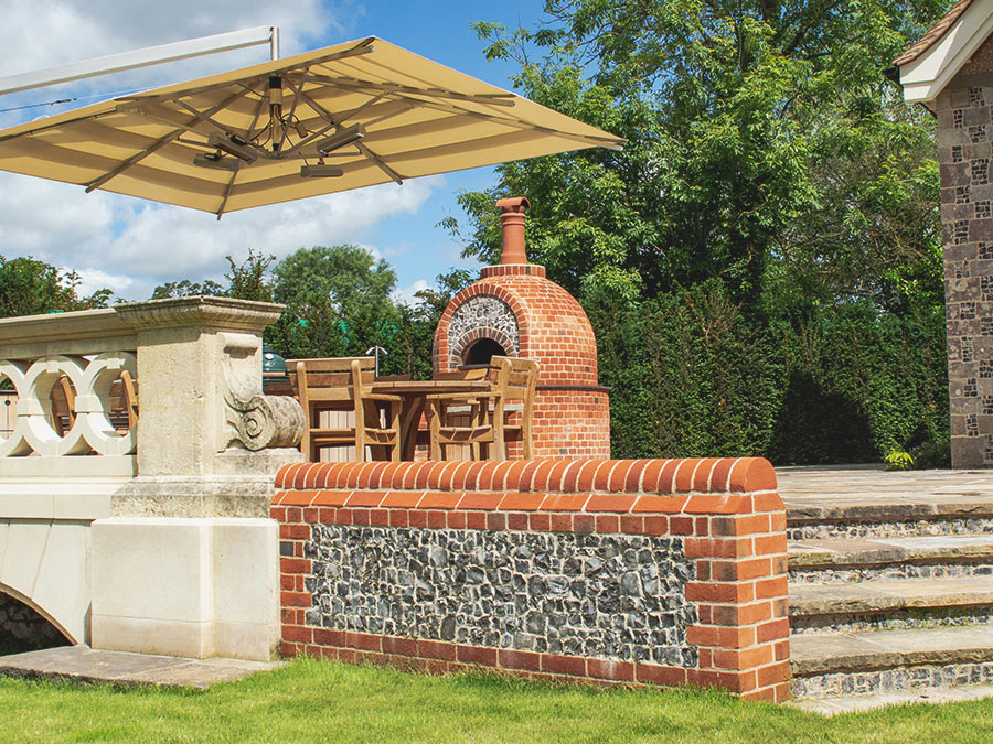 Knapped flint wall outdoor kitchen garden