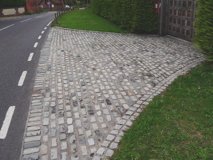 Reclaimed granite street cobbles driveway entrance