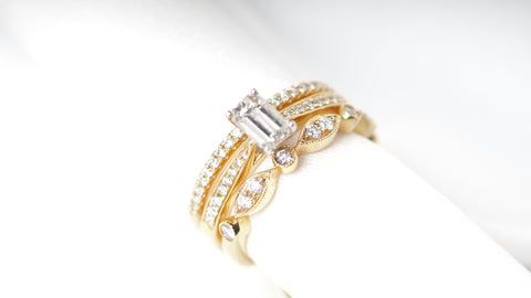 emerald cut diamond engagement ring yellow gold wedding ring Harrogate jewellers Fogal and Barnes