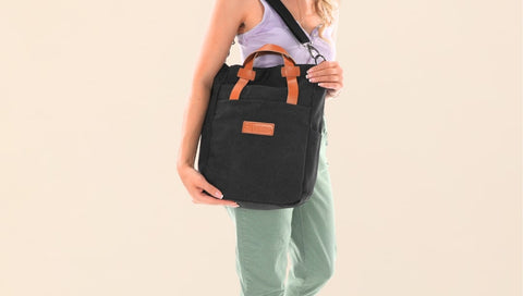 Image of woman carrying a convertible bag - sustainable bag