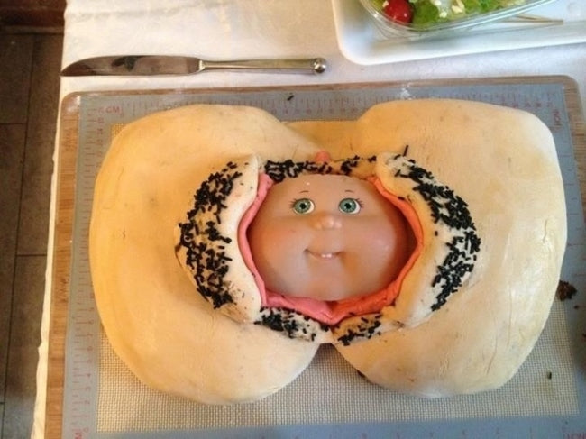[Baby Shower[ Epic Fails: Disaster Cakes That Will Make You Cringe] - [Showing Baby Head cake]]