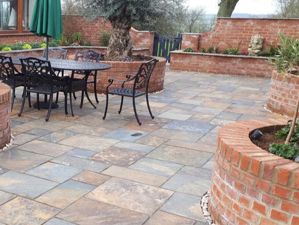 porcelain vs stone paving