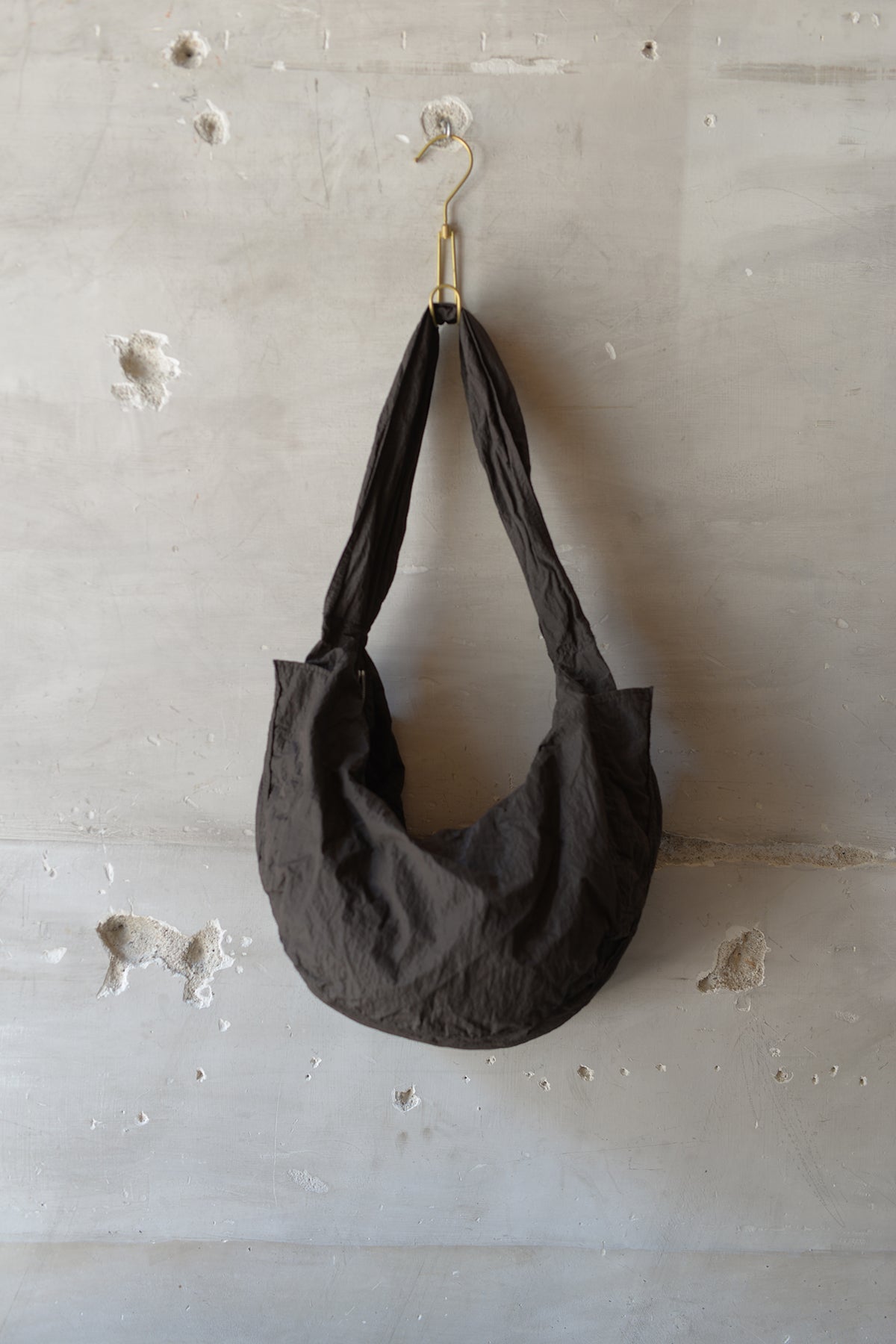 omar afridi DISTORTED HAND BAG-