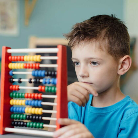 ADHD boy with an abacus