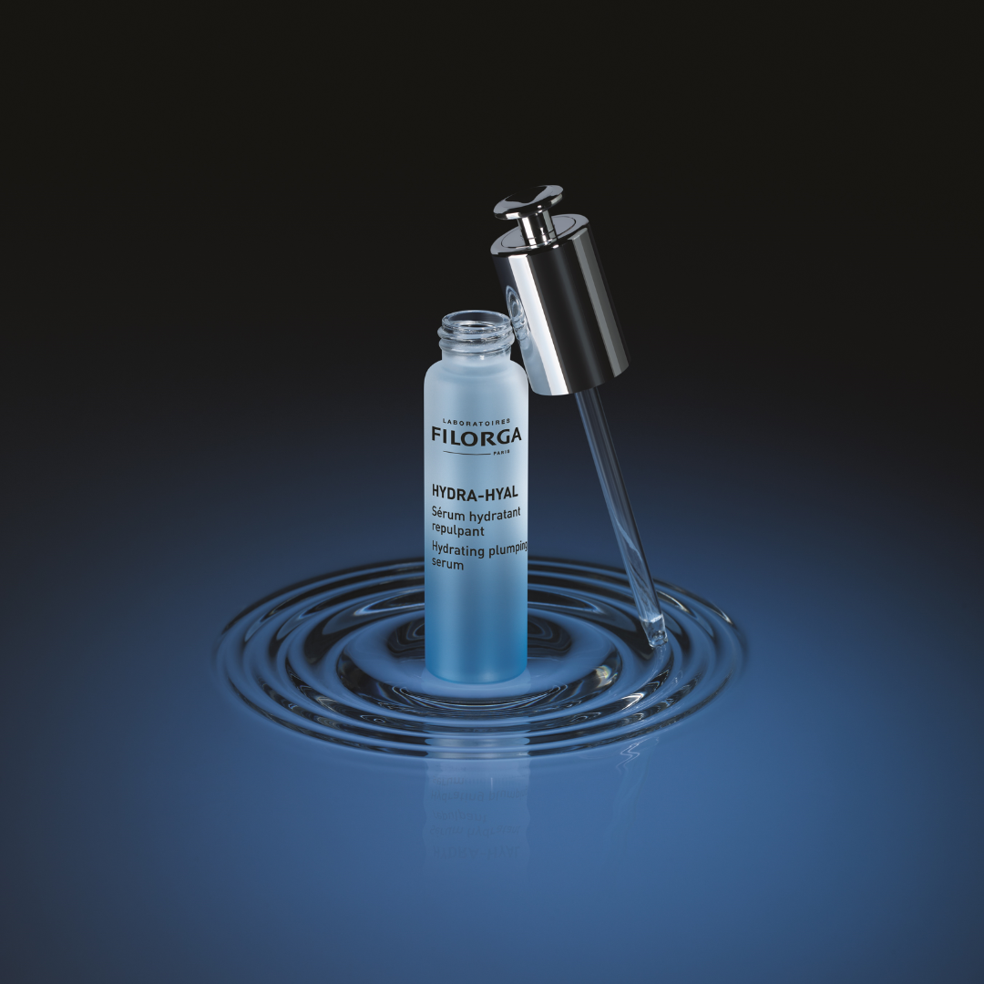 FILORGA HYDRA-HYAL SERUM open bottle with pipette in water