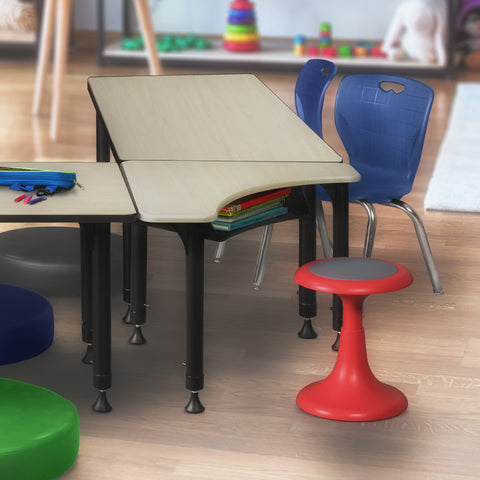 wobble stool next to collaborative activity tables and school desks