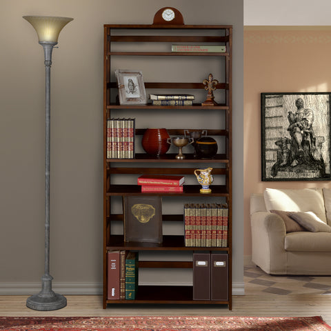 foldable bookcase displaying books and pictures in a living room