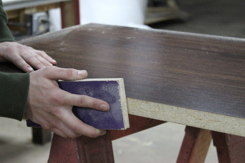 Sanding edge of custom made table