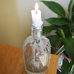 Reuse glass bottle as a candlestick holder