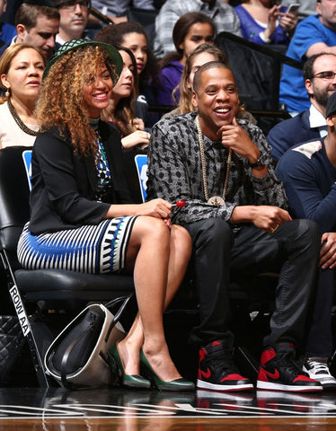 Jay Z And Beyonce Sitting Court Side Rocking Jordan 1 Bred