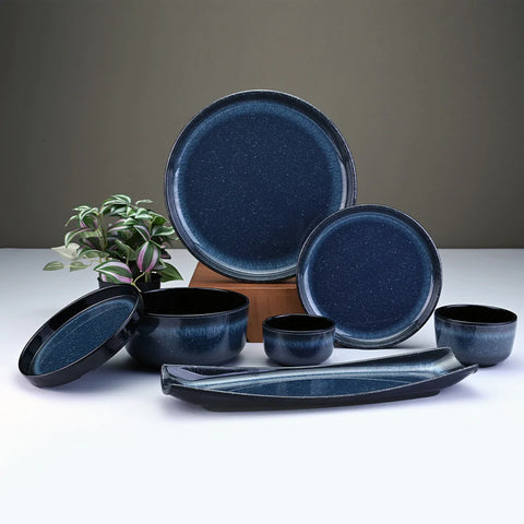 Cosmos Dinner-set with a black design on the rims by Servewell