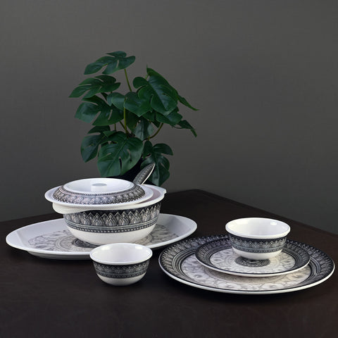 Plates with intrinsic designs makes for an exquisite tablescape for a vintage themed cafe