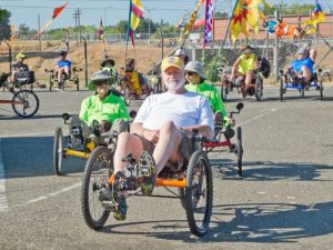 happy customers riding recumbent trikes