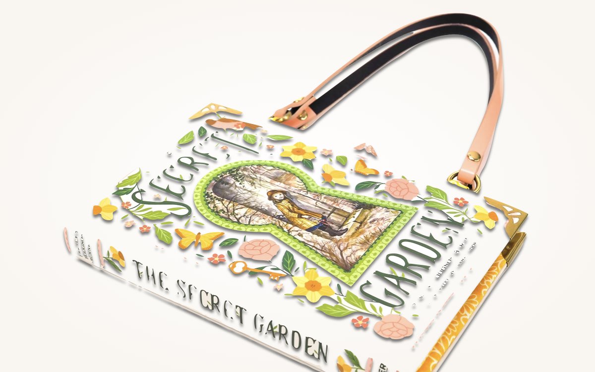 a purse made from hard covered children's books