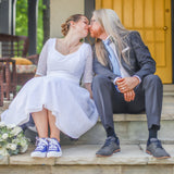 kiss on the front porch after the wedding