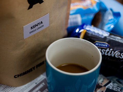 chimney fire coffee and cup and biscuits