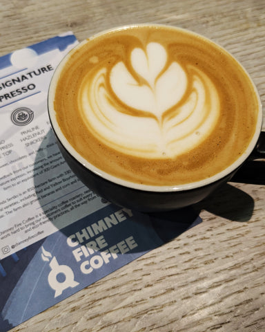 magic coffee with heart shaped latte art