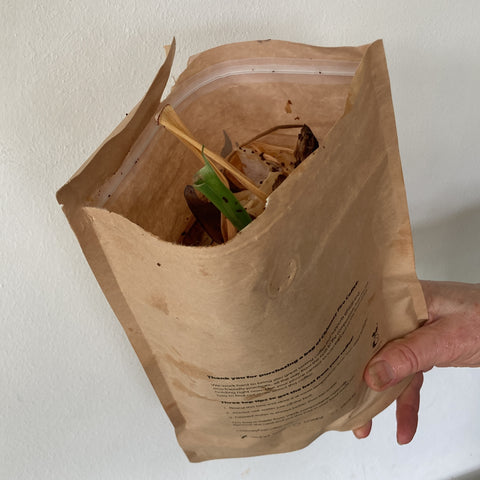 waste vegetables in used coffee bag
